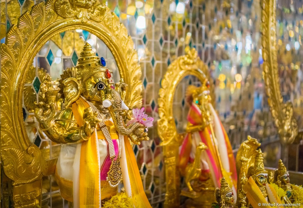 Golden ganesha in Arulmigu Sri Rajakaliamman Glass Temple in Johor Bahru, Malaysia.