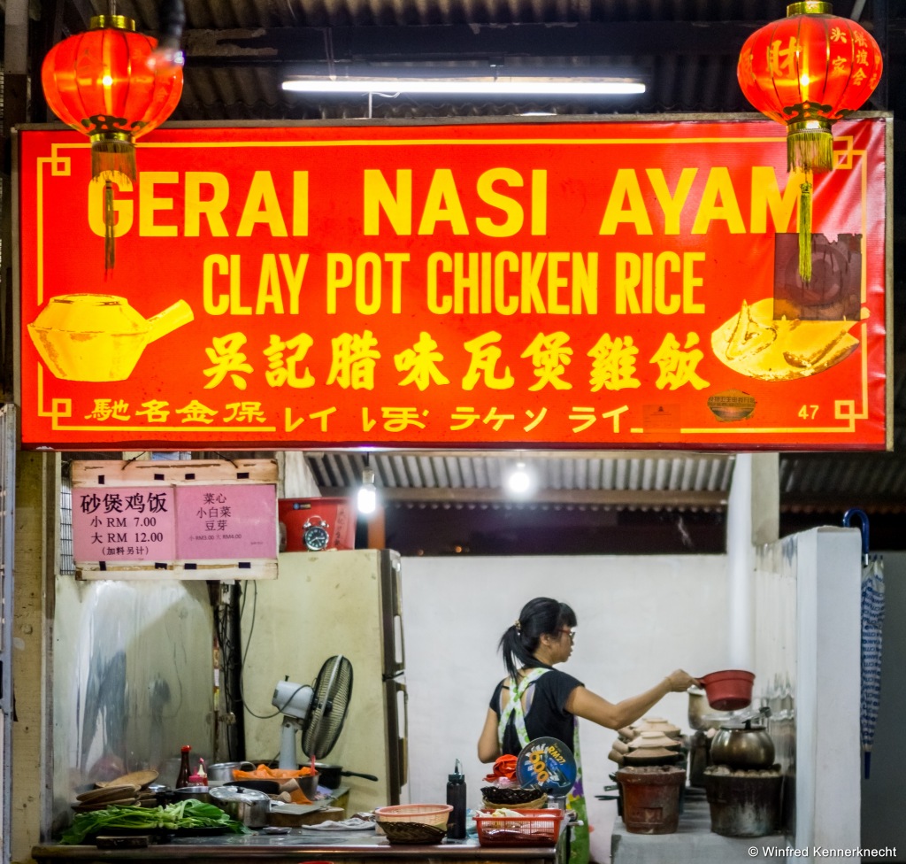 Clay pot chicken rice stall at cedar point food court in Johor Bahru, Malaysia.